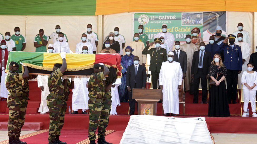 President Macky Sall (centre) led the tributes