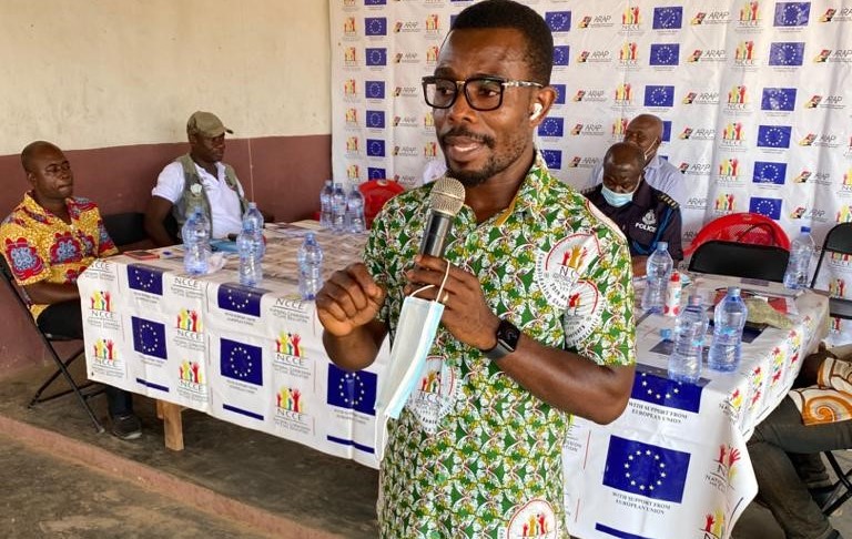 Mr. Evans Nunoo, NCCE District Director giving a welcome address