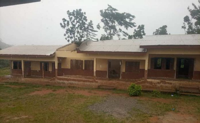 rainstorm rips off roof of school building